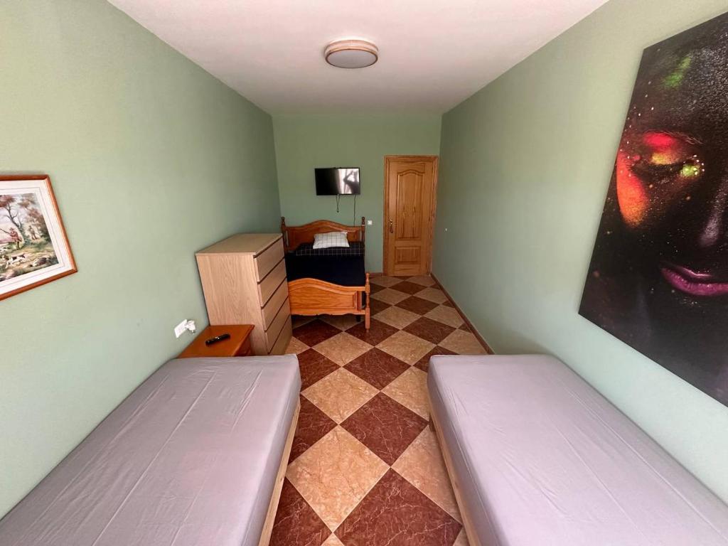 Postel nebo postele na pokoji v ubytování Moto Vila Groot