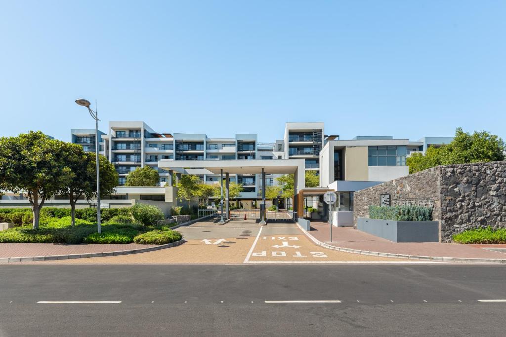 an empty street in front of a building at The Terraces Luxury Apartments in Cape Town