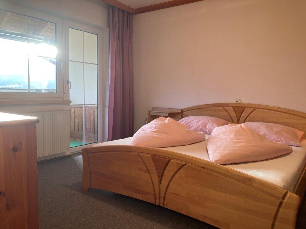 Postel nebo postele na pokoji v ubytování Motel Brunner Apartments & Zimmer