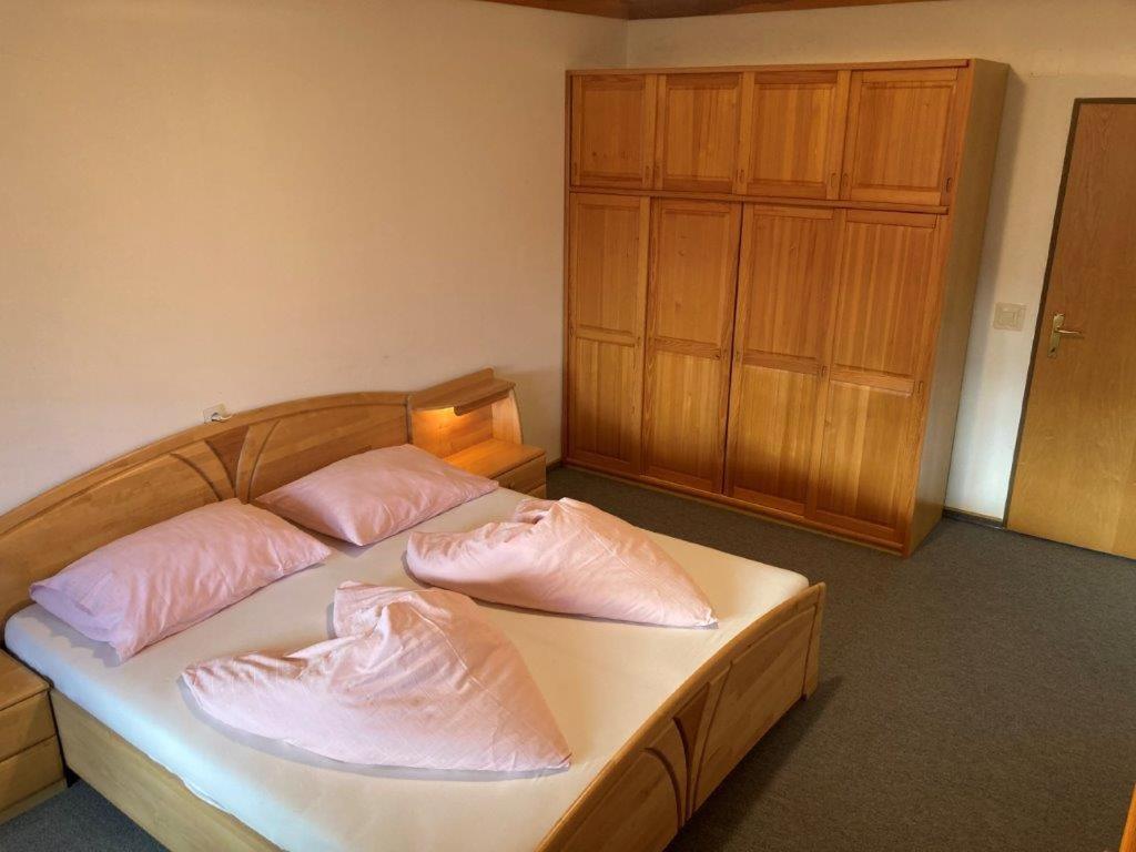 Postel nebo postele na pokoji v ubytování Motel Brunner Apartments & Zimmer