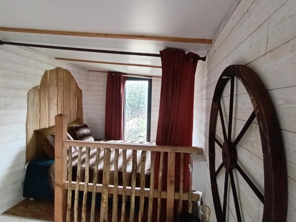 Postel nebo postele na pokoji v ubytování hébergement insolite