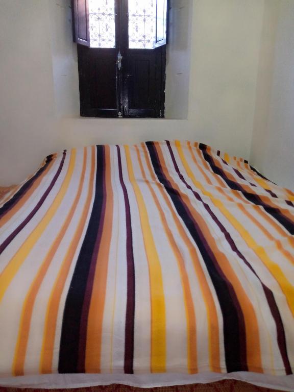 Postel nebo postele na pokoji v ubytování Guest house tassaoute