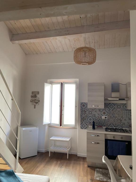 Kuchyň nebo kuchyňský kout v ubytování Catalogna10 Loft Suite