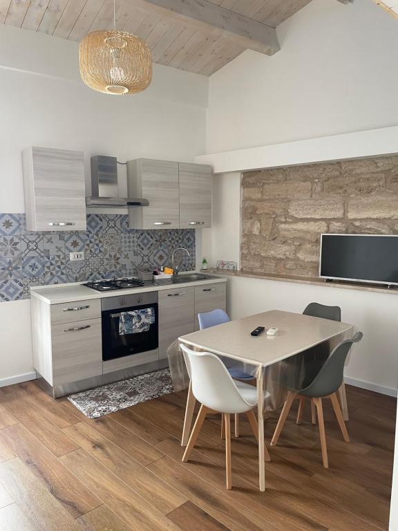 Kuchyň nebo kuchyňský kout v ubytování Catalogna10 Loft Suite