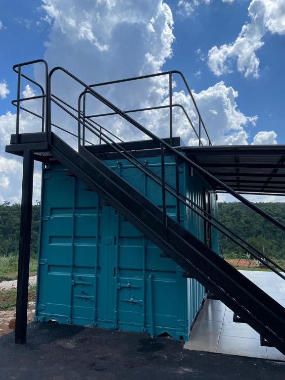 a staircase on the side of a building at Container Home Py in Puerto Presidente Franco