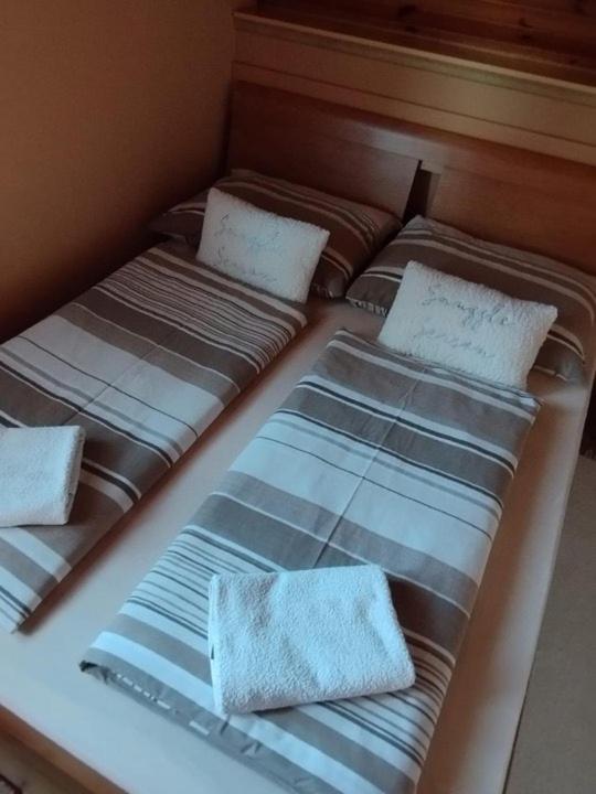 Posteľ alebo postele v izbe v ubytovaní Apartmánový dom Anna