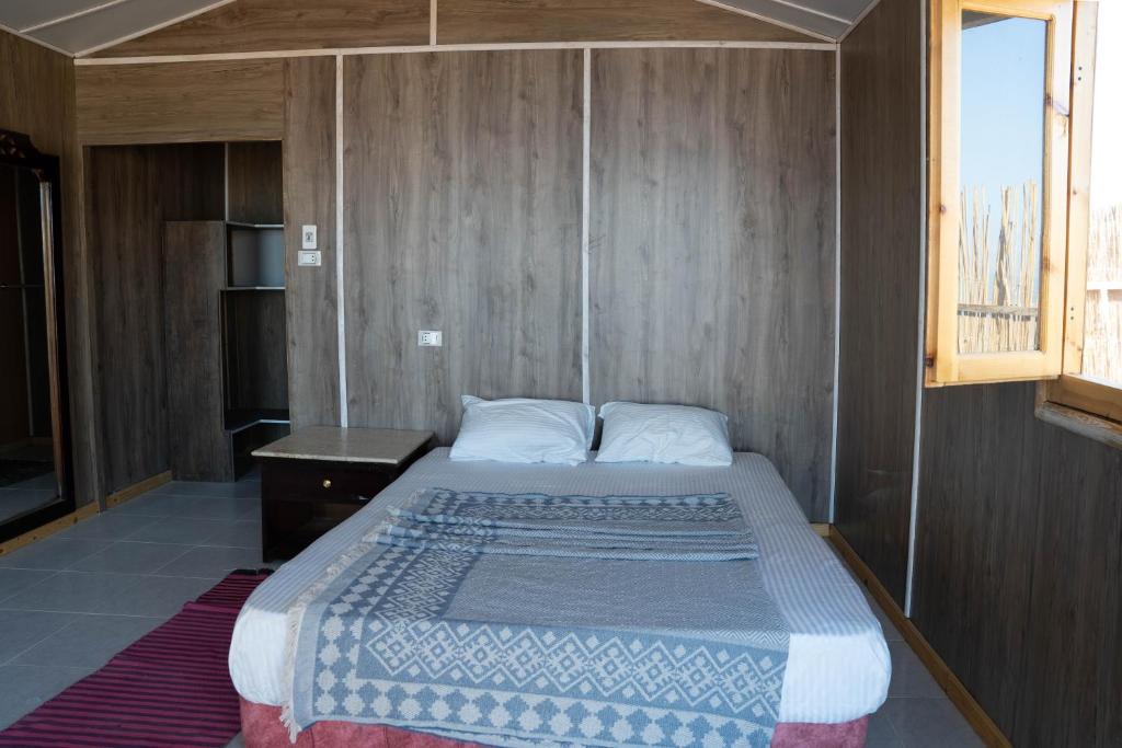 Ліжко або ліжка в номері Manta Beach