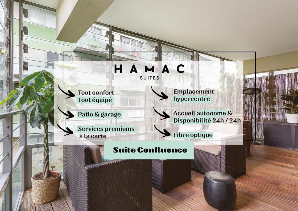 a glass wall with a sign that reads hano namespace at Hamac Suites - Le confluence terrasse garage-4pers in Lyon