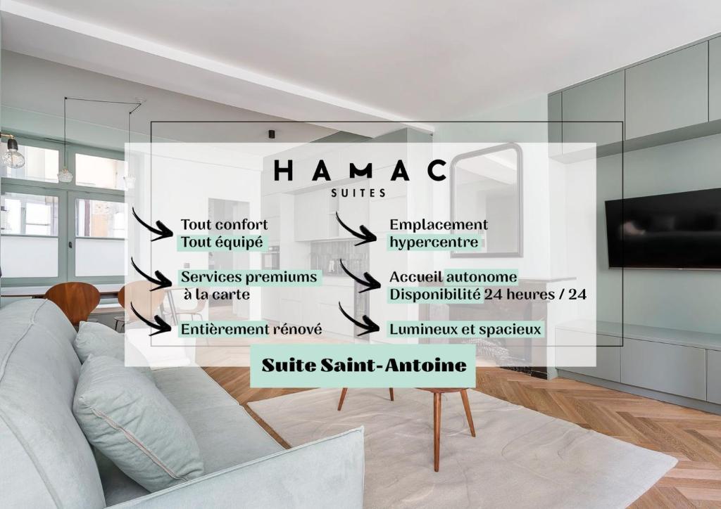 a living room with a wall mural of the names of homes at HAMAC Suites / Suite St Antoine / 2 CH / Unique in Lyon