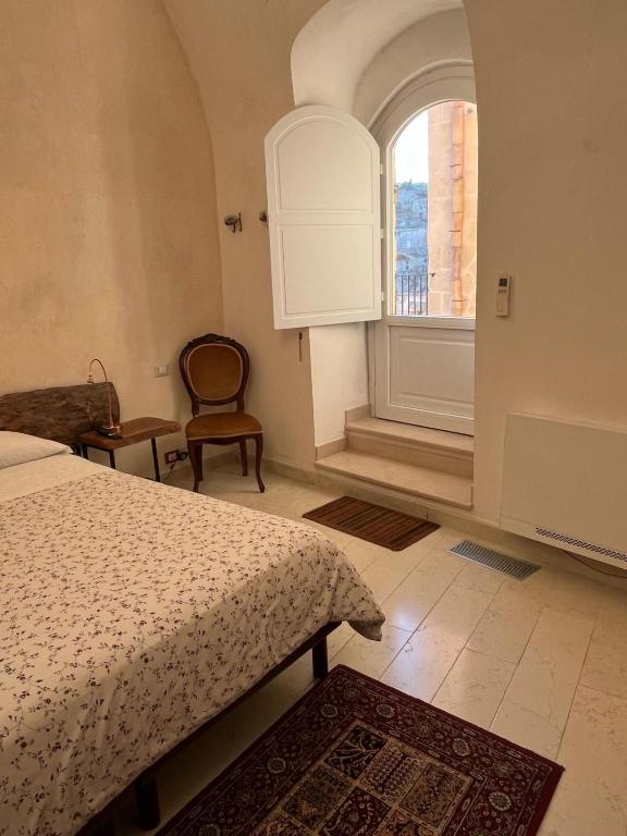 Postel nebo postele na pokoji v ubytování Locus Amoenus