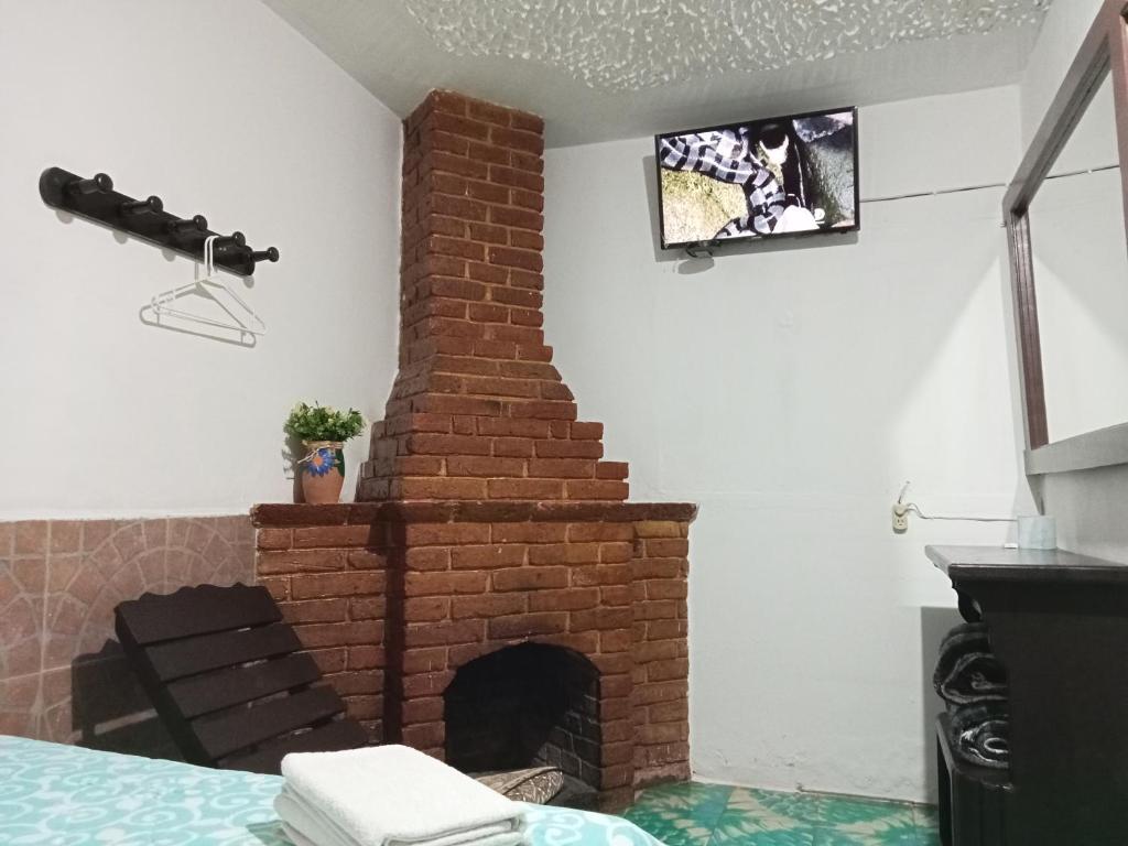 Hotel Posada El Gran Cipres - Triple Room With Private Bathroom