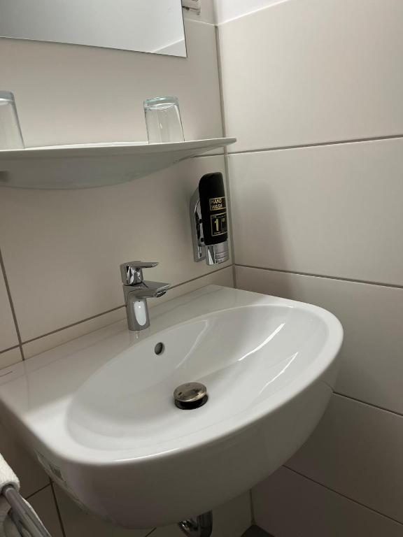Koupelna v ubytování City Hotel Post 11