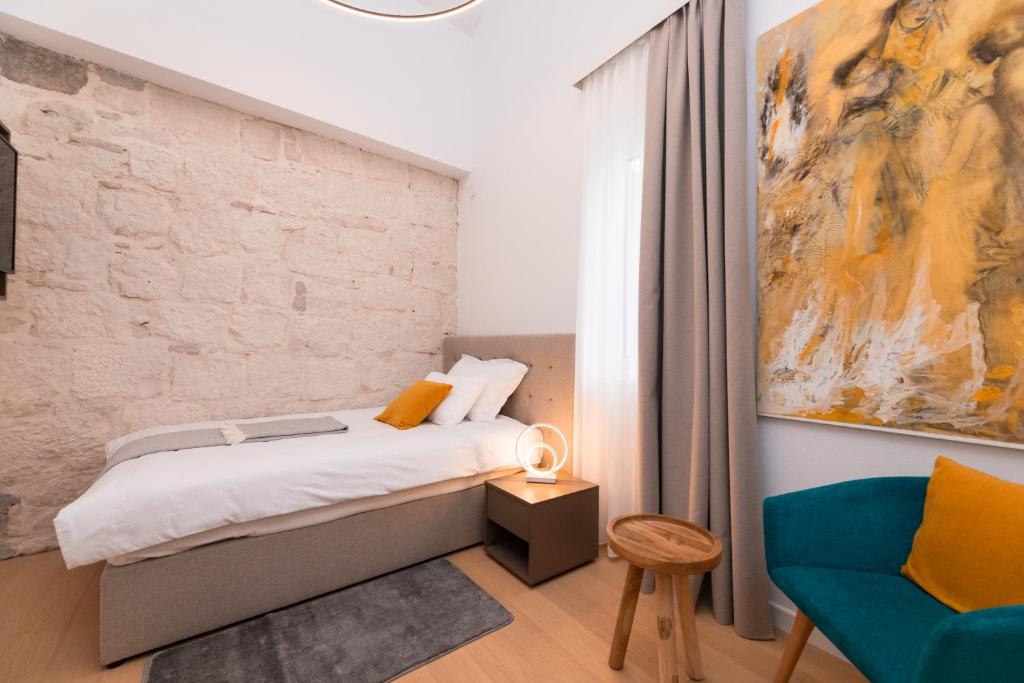 Postel nebo postele na pokoji v ubytování Hotel Sveta Ana