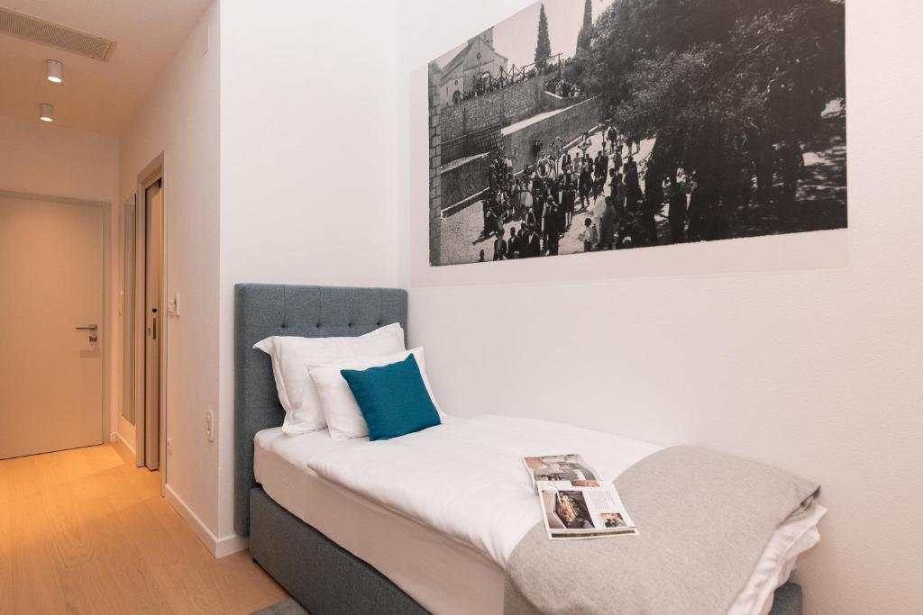 Postel nebo postele na pokoji v ubytování Hotel Sveta Ana