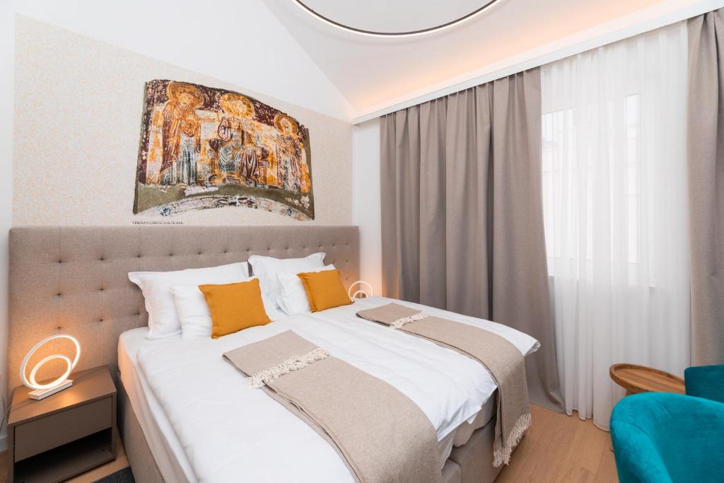 Postel nebo postele na pokoji v ubytování Hotel Sveta Ana