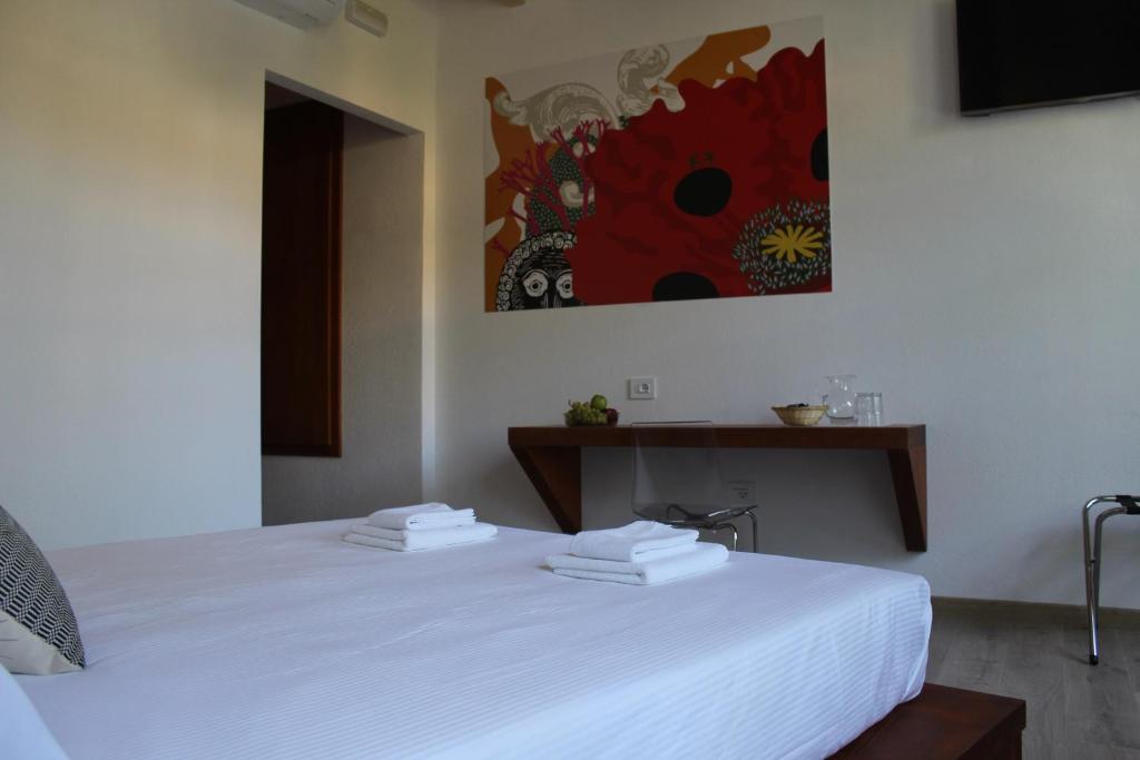 Postel nebo postele na pokoji v ubytování Art Guest House