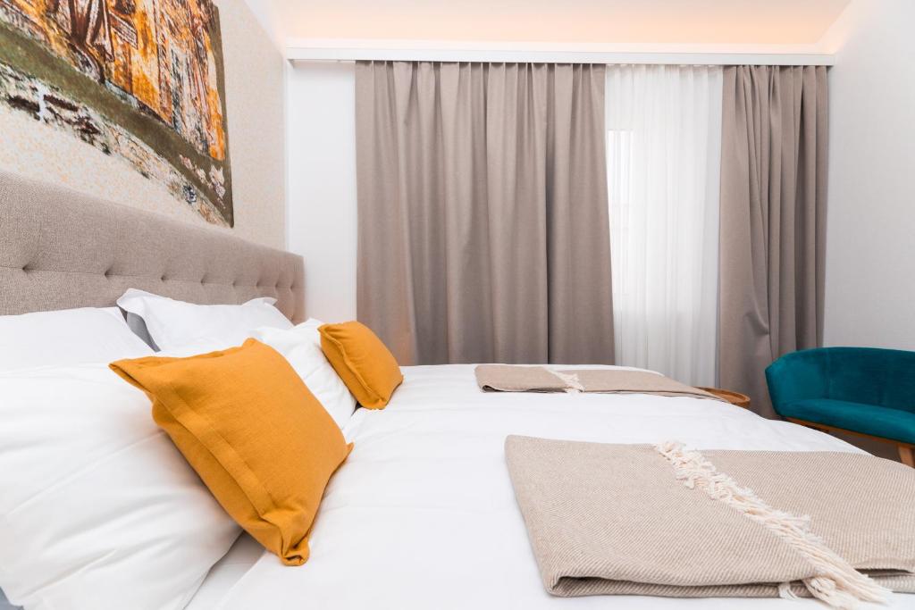 Postel nebo postele na pokoji v ubytování Hotel Sveta Ana