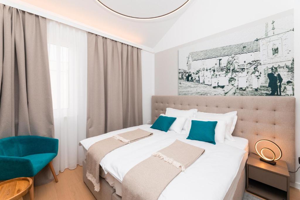 Postel nebo postele na pokoji v ubytování Hotel Sveta Ana
