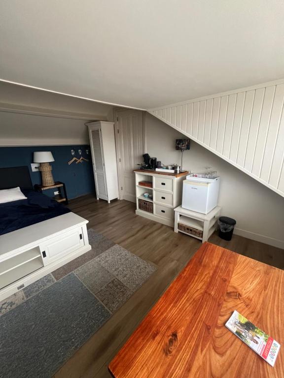 Kuchyň nebo kuchyňský kout v ubytování B&B De Koog Texel