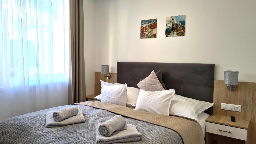 Posteľ alebo postele v izbe v ubytovaní Spa Residence Carbona 101, 307 Apartman