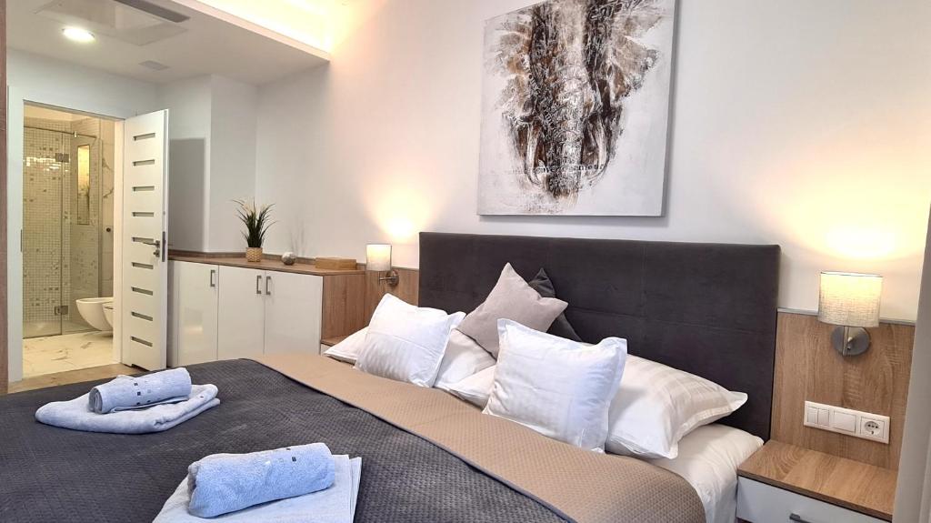 Posteľ alebo postele v izbe v ubytovaní Spa Residence Carbona 101, 307 Apartman