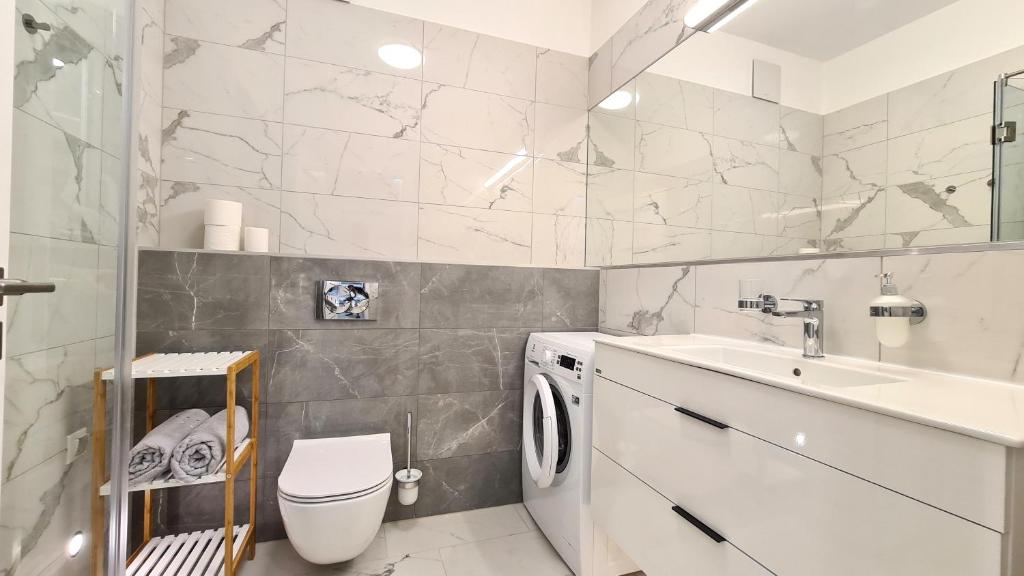 Kúpeľňa v ubytovaní Spa Residence Carbona 101, 307 Apartman
