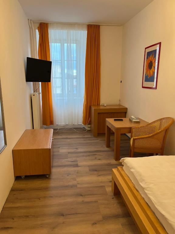 Postel nebo postele na pokoji v ubytování City Hotel Post 21