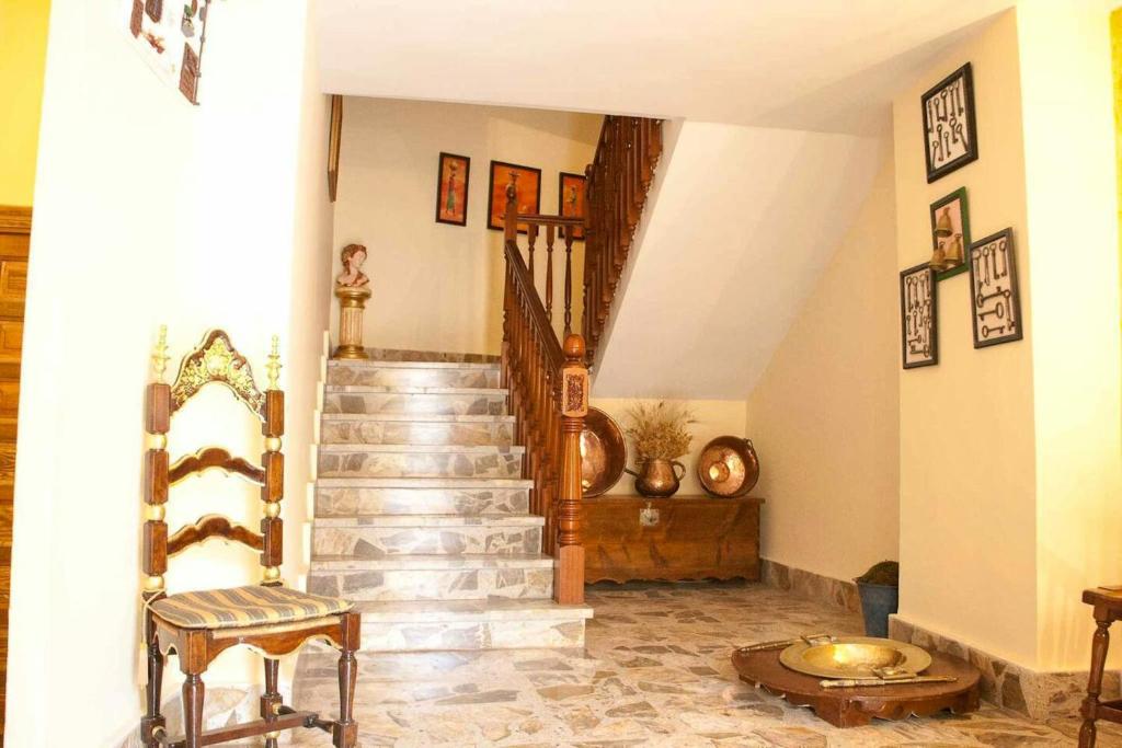a hallway with a staircase in a house at 4 bedrooms appartement with wifi at Munebrega in Munébrega