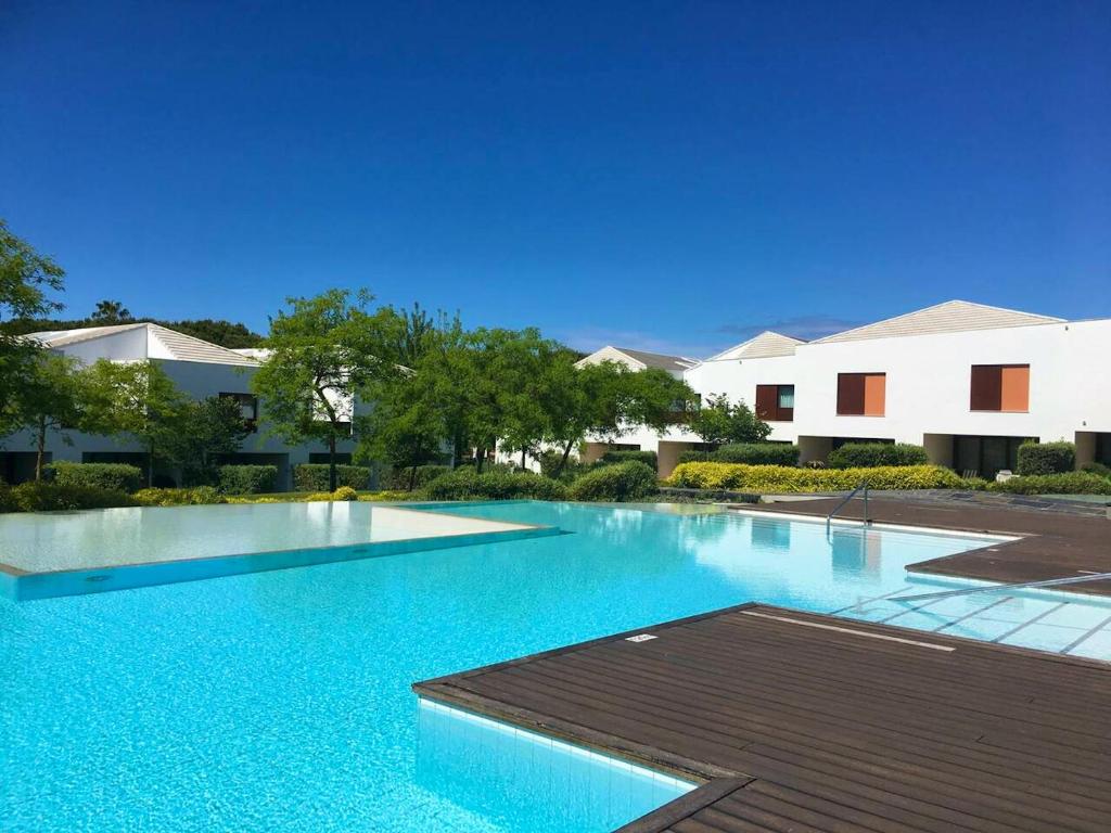 Charming House in Olhos de Agua with Shared Pool