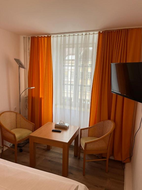 Postel nebo postele na pokoji v ubytování City Hotel Post 22