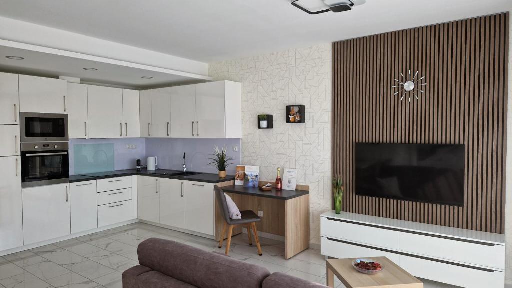 Kuchyňa alebo kuchynka v ubytovaní Spa Residence Carbona 101, 307 Apartman