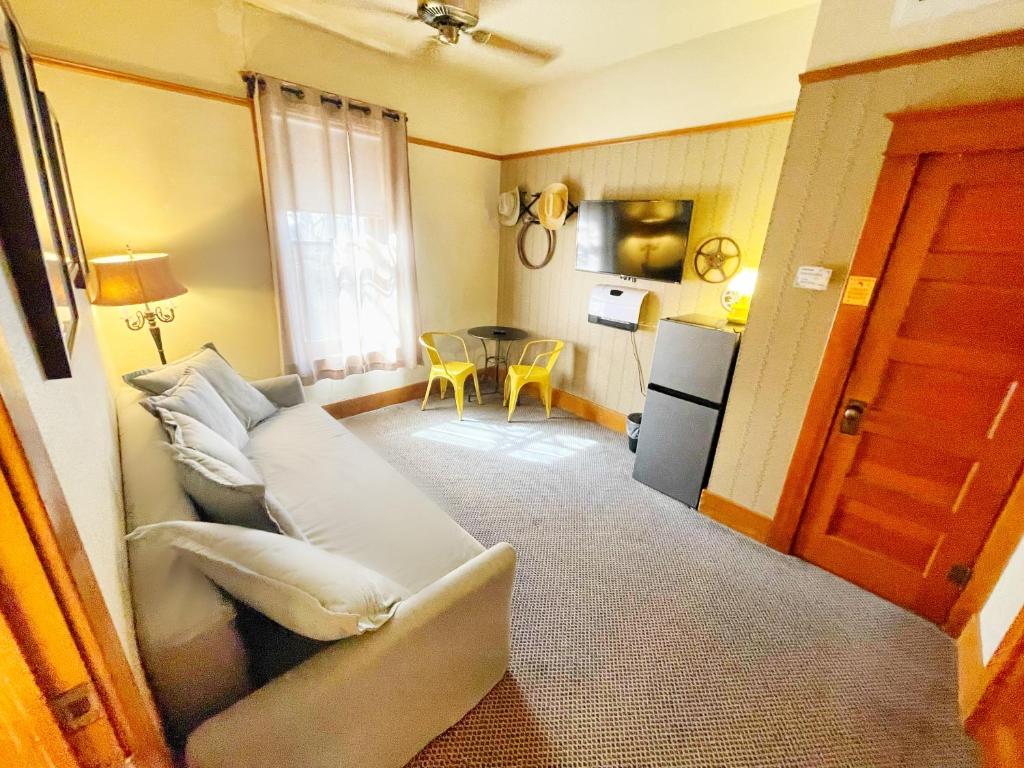 Postel nebo postele na pokoji v ubytování Hotel Vendome