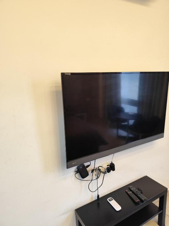 TV a/nebo společenská místnost v ubytování Gentle Breeze Studio 2
