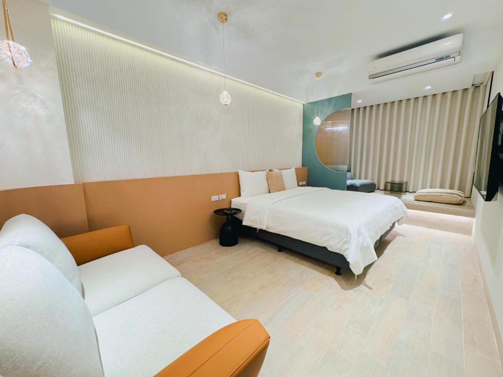 Postel nebo postele na pokoji v ubytování Enjoy Homestay