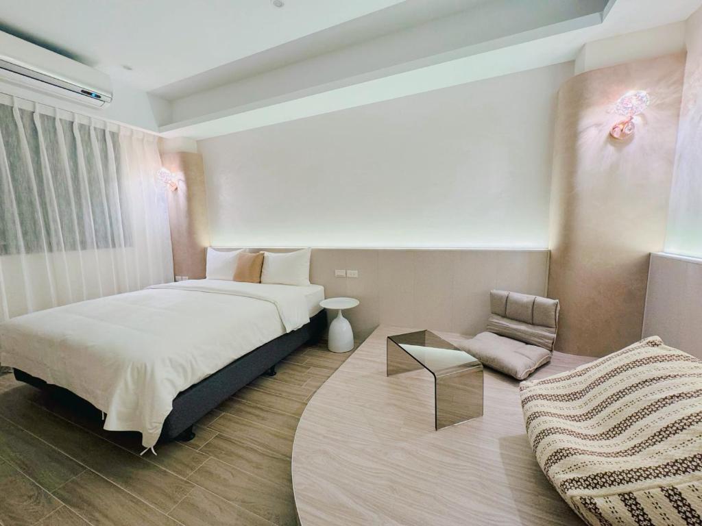 Postel nebo postele na pokoji v ubytování Enjoy Homestay