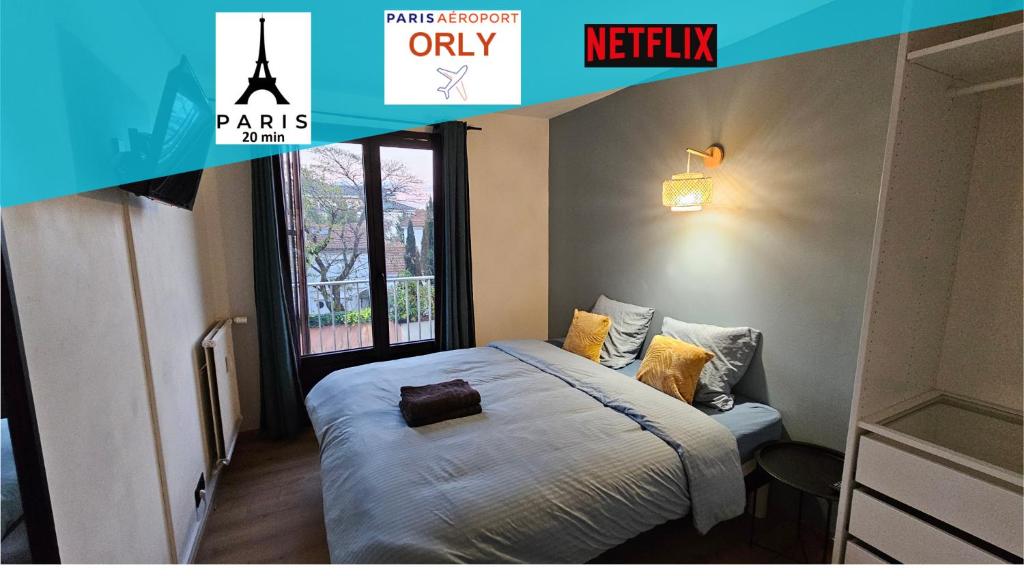a bedroom with a bed and a window at Maison des voyageurs Azur - PARIS ORLY in Choisy-le-Roi