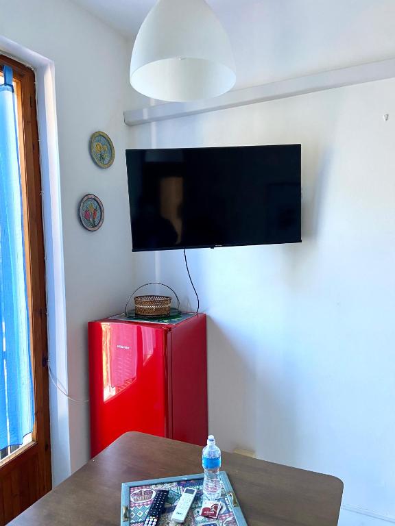 TV a/nebo společenská místnost v ubytování Sunlight Apartment