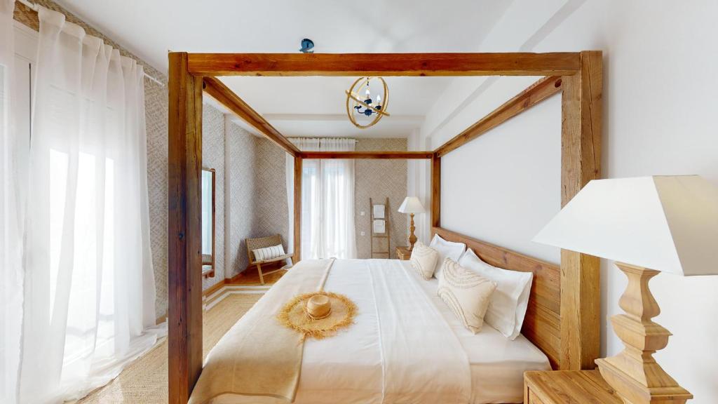 Tempat tidur dalam kamar di MOENIA LUXURY APARTMENT