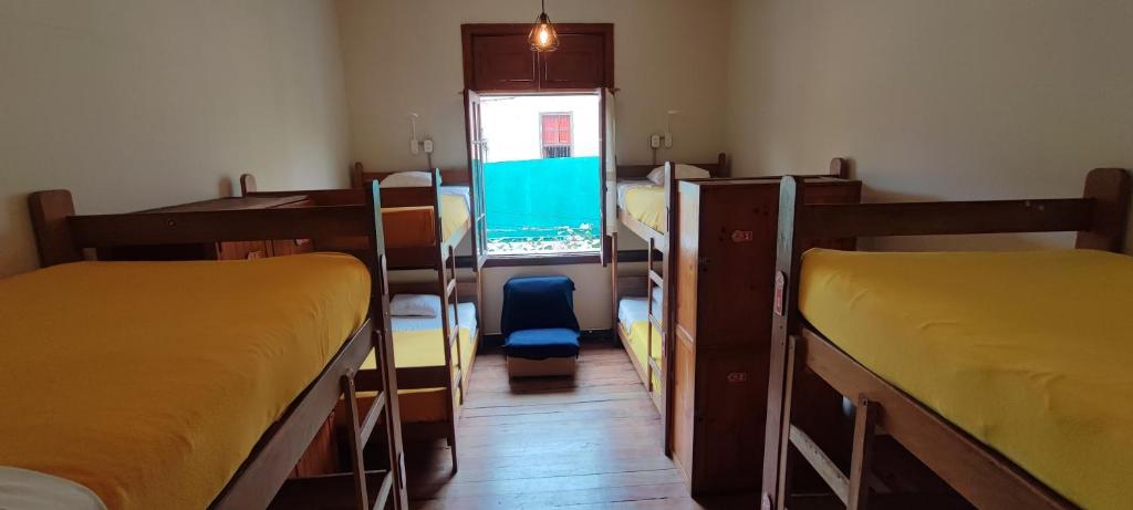 Postel nebo postele na pokoji v ubytování Flying Dog Lima B&B