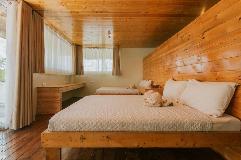 Postel nebo postele na pokoji v ubytování Kaway Resort & Spa