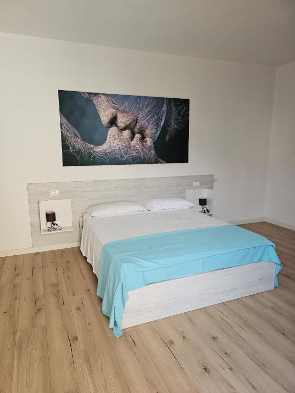 Postel nebo postele na pokoji v ubytování Via San Zeno Home