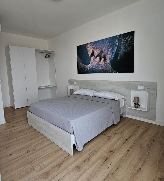 Postel nebo postele na pokoji v ubytování Via San Zeno Home