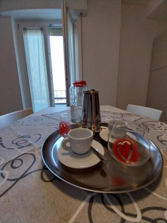 Příslušenství pro přípravu čaje a kávy v ubytování Via San Zeno Home