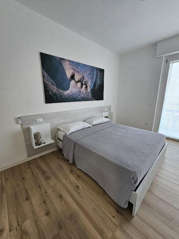 Postel nebo postele na pokoji v ubytování Via San Zeno Home