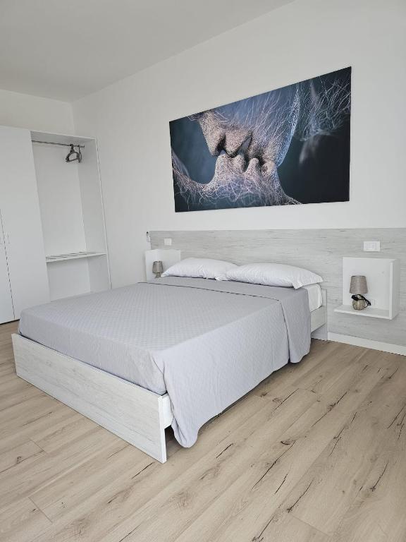 Postel nebo postele na pokoji v ubytování Via San Zeno Home