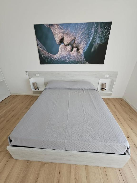 Postel nebo postele na pokoji v ubytování Via San Zeno Home