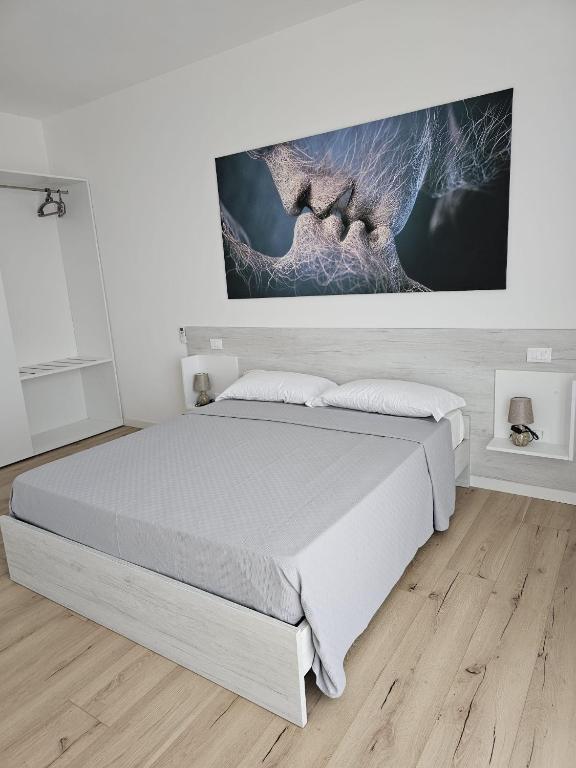 Postel nebo postele na pokoji v ubytování Via San Zeno Home