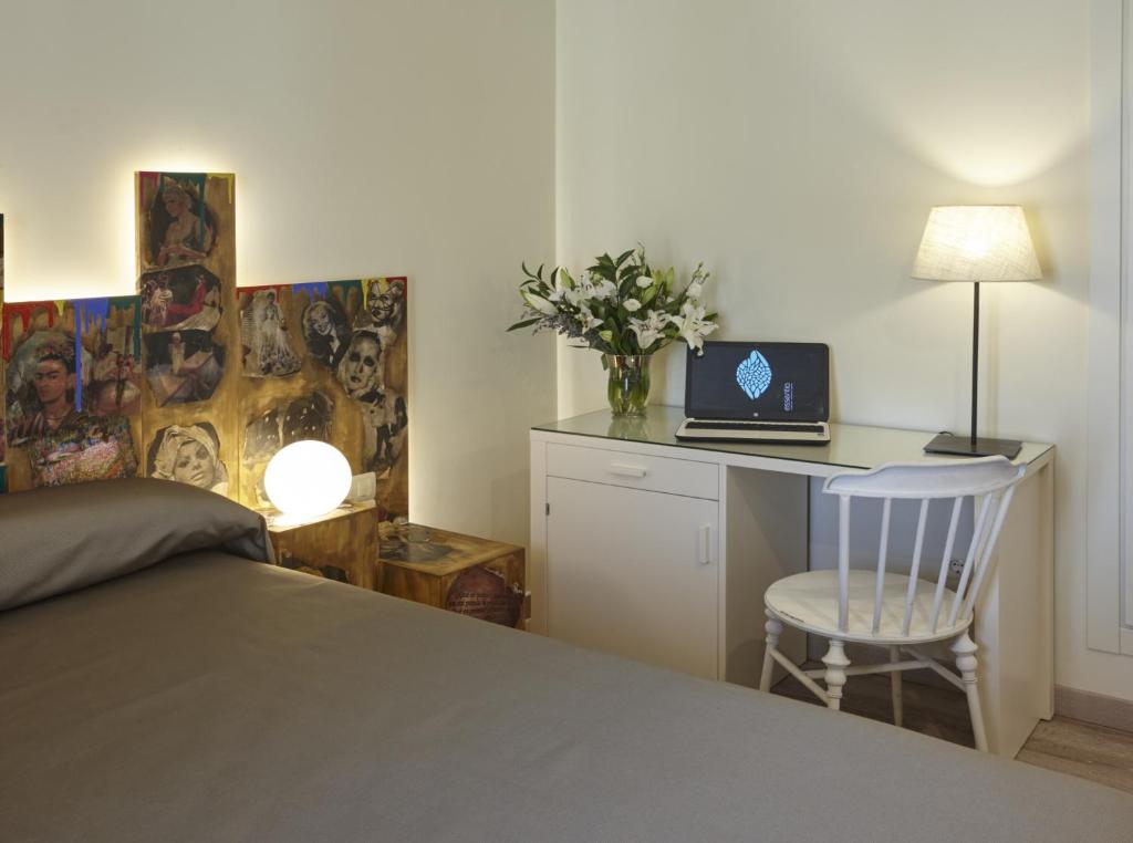 Posteľ alebo postele v izbe v ubytovaní Hotel Galería Essentia