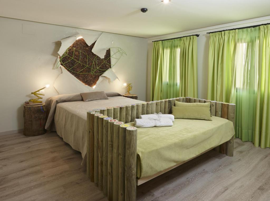 Posteľ alebo postele v izbe v ubytovaní Hotel Galería Essentia