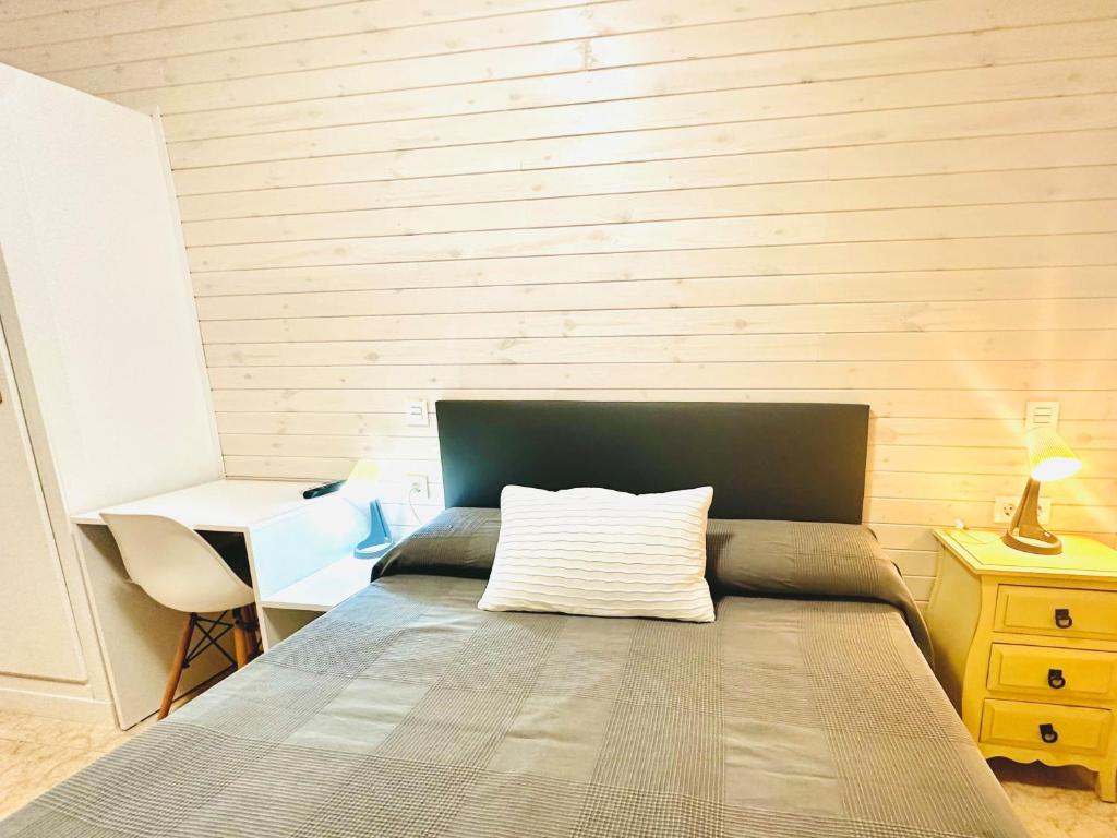Postel nebo postele na pokoji v ubytování Hostal La Taberna